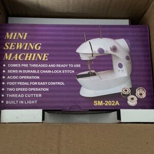 SM-202A Mini Sewing Machine - White and Purple